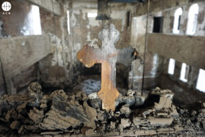 Cruz quemada en la catedral copta de San Jorge, en Luxor (Egipto) Cruz quemada en la catedral copta de San Jorge, en Luxor (Egipto)